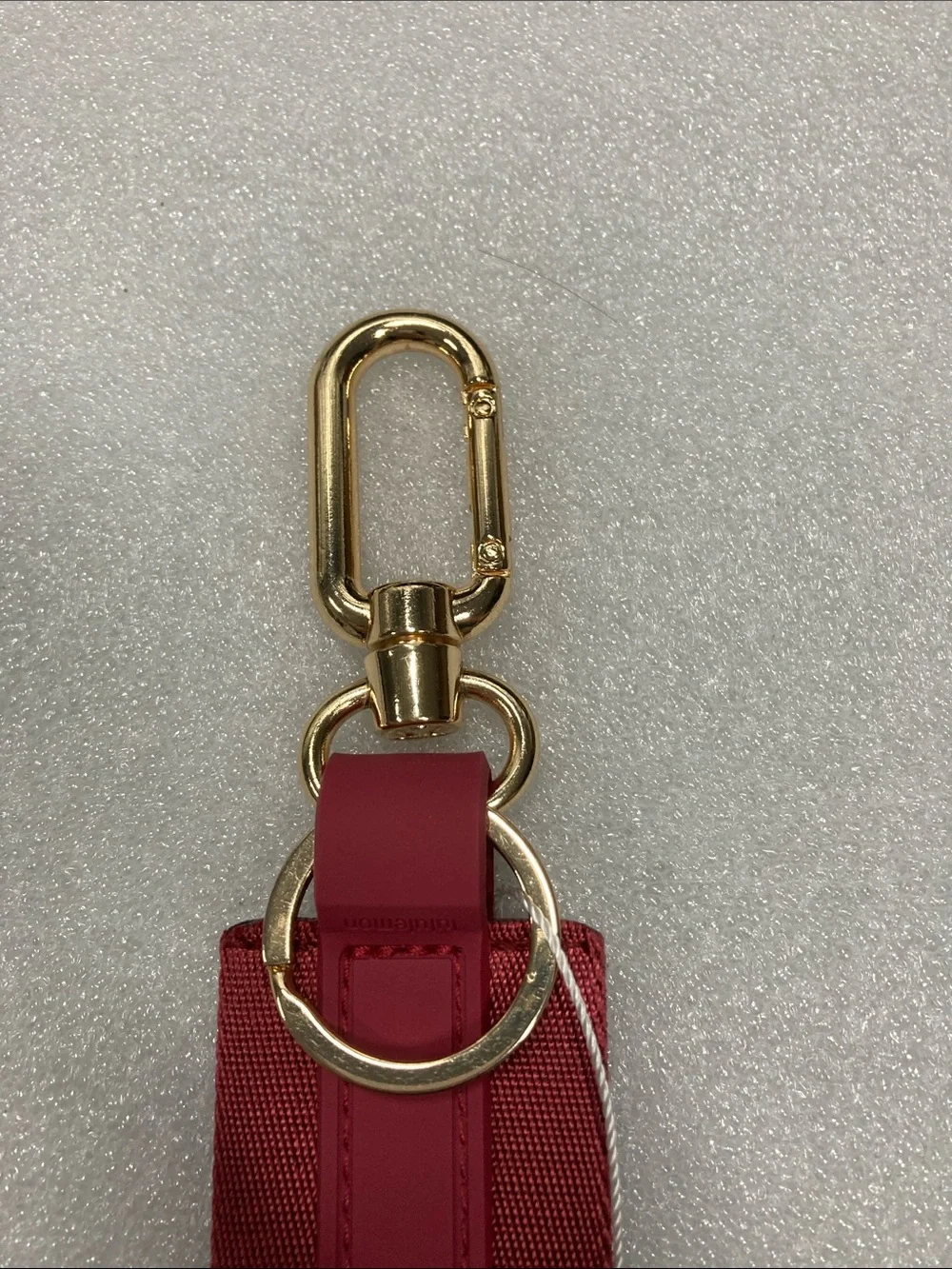 lululemon athletica Never Lost Keychain Wristlet - Maroon with Gold